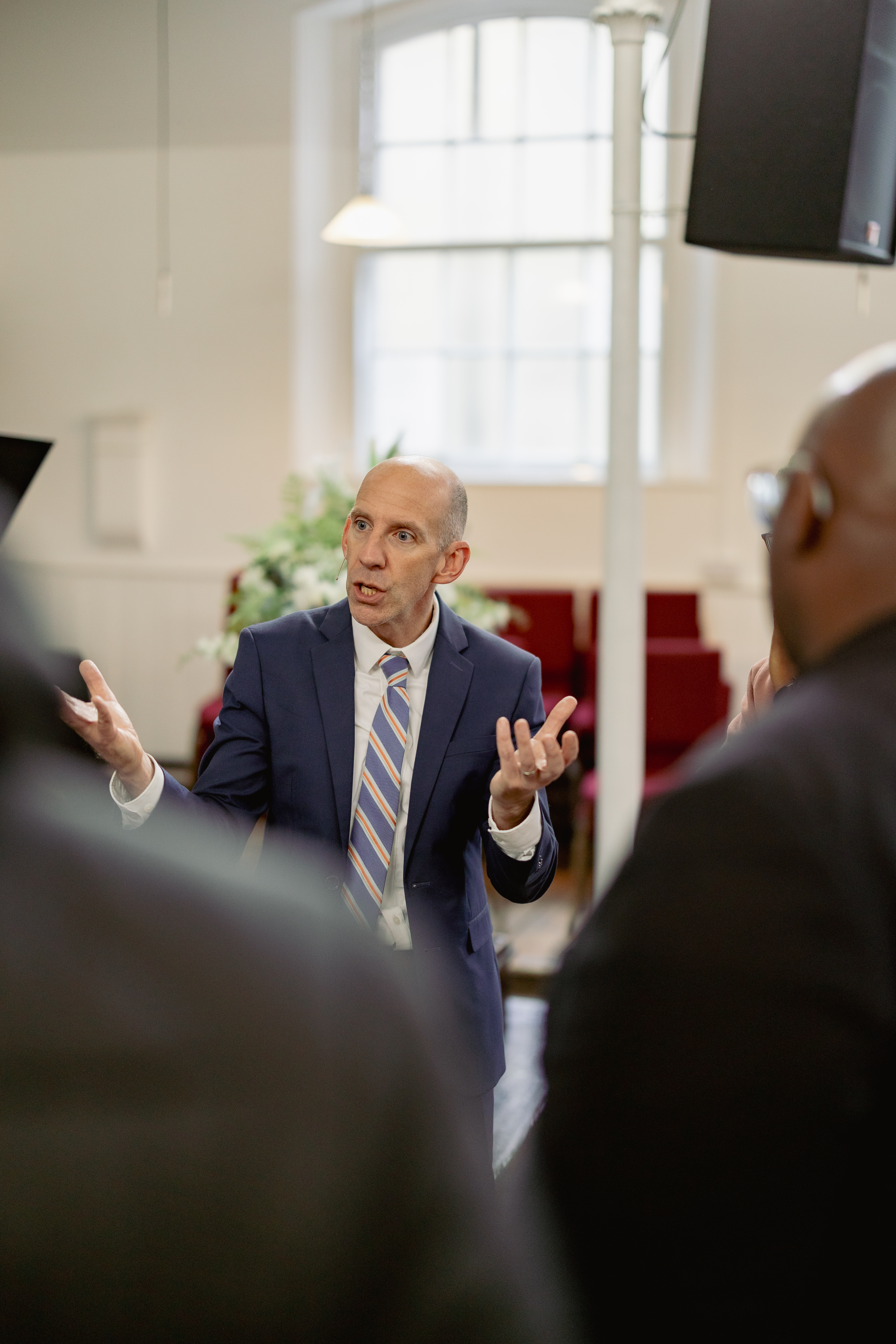 Jerod Gilcher speaking to some Bible Survey students